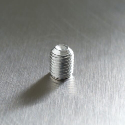 Un tornillo sin cabeza de punta de copa